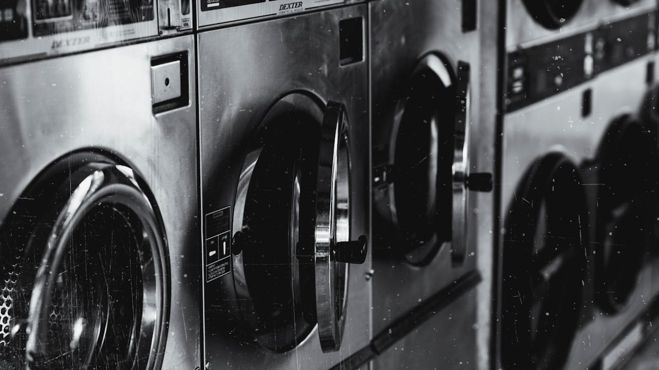 Grayscale Photo of Washing Machine