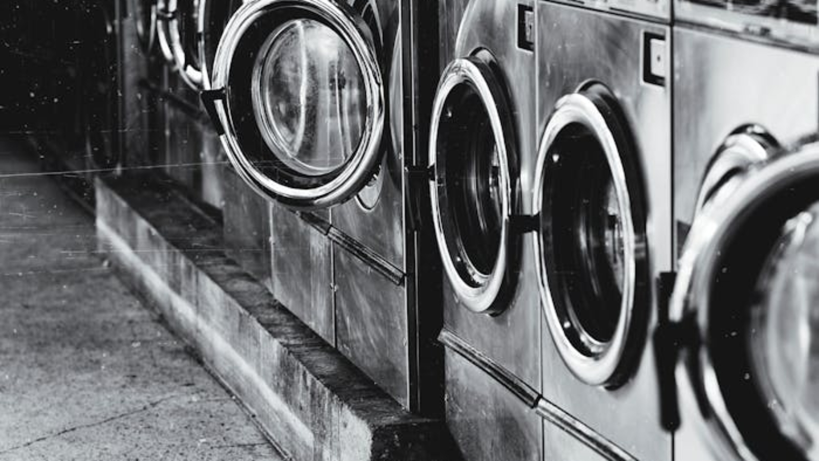 Grayscale Photography of Front-load Washers